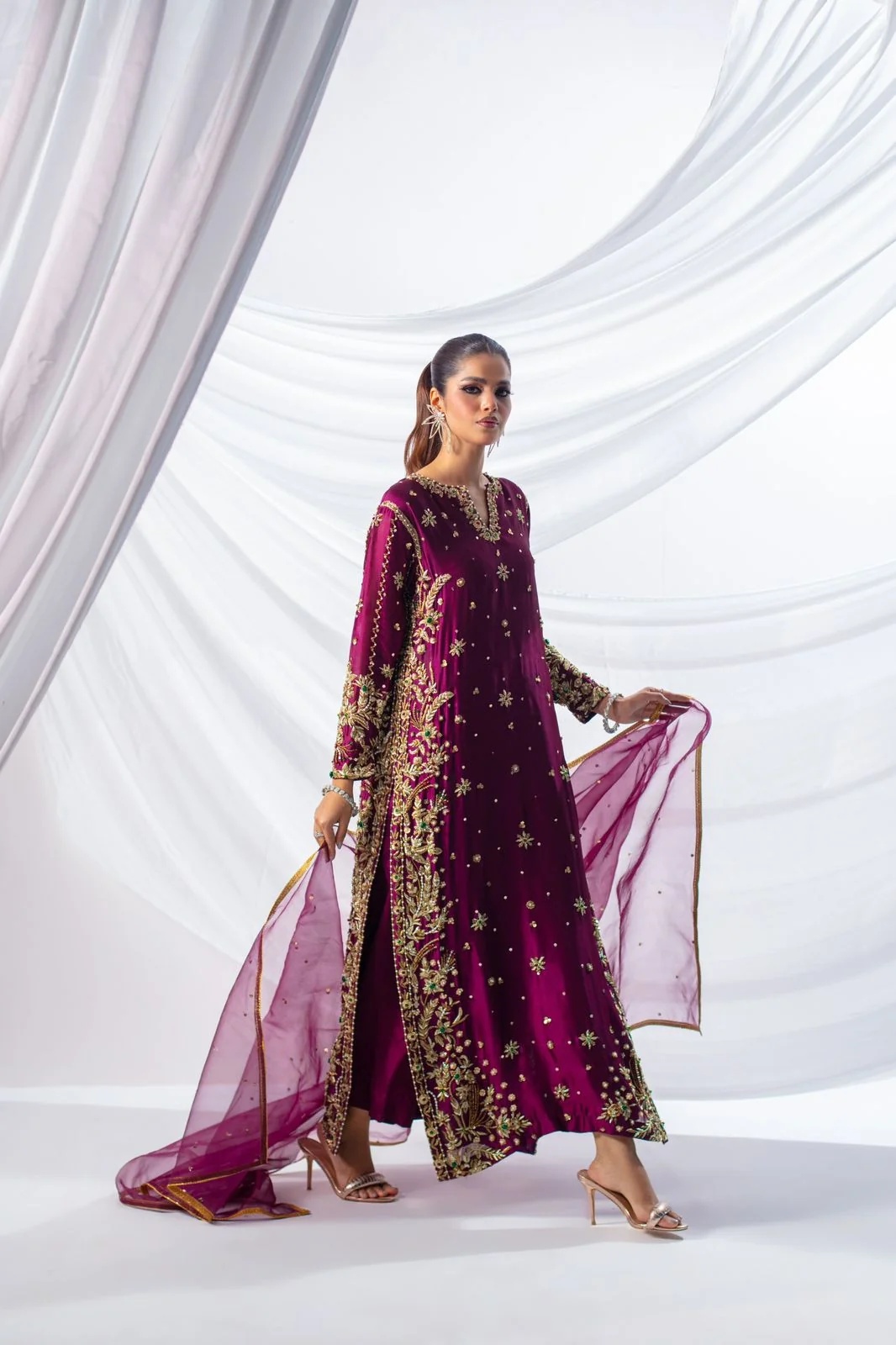 02 pakistani fashion outfit with coordinated formal styling.