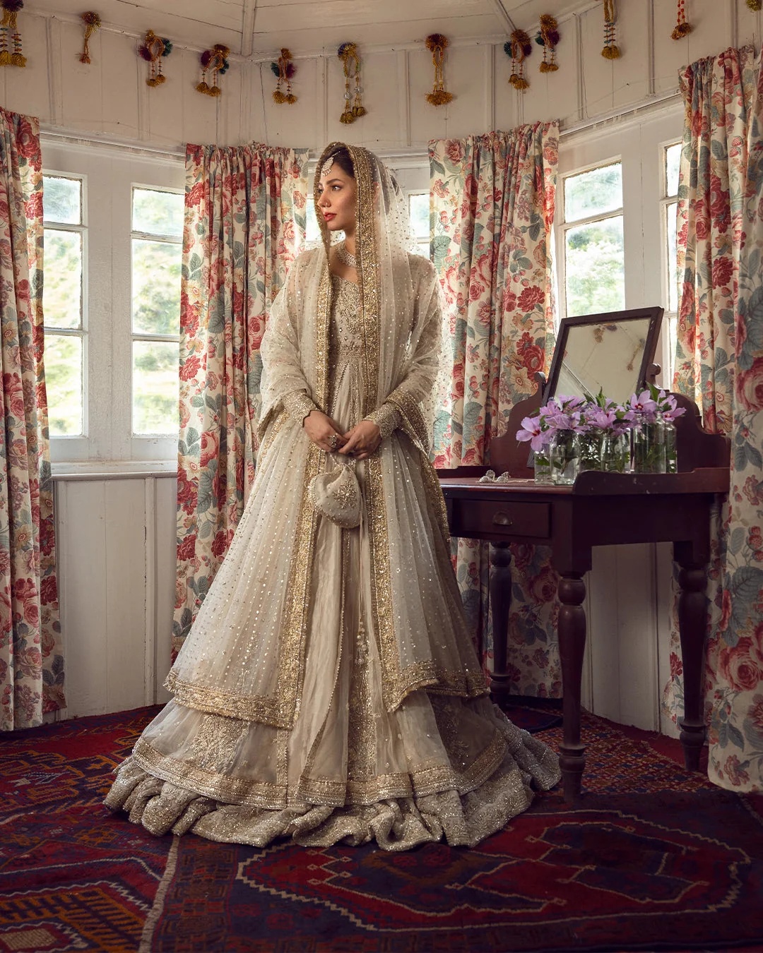 Anamta pakistani fashion outfit in ivory tones.