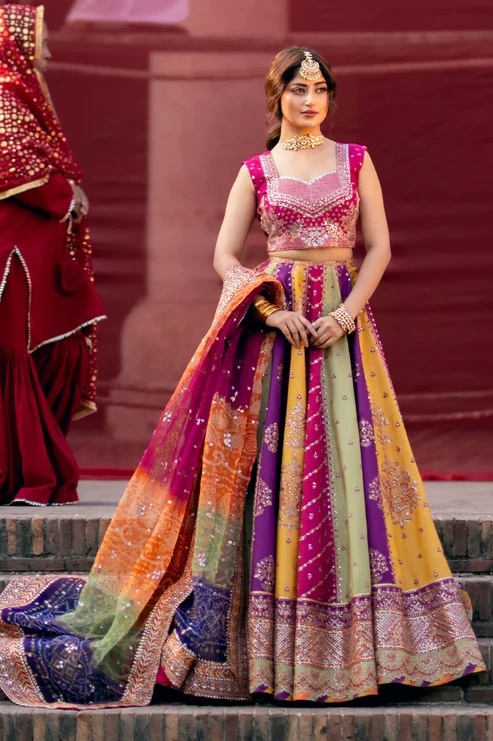 Bin Ilyas pakistani fashion outfit with coordinated formal styling.