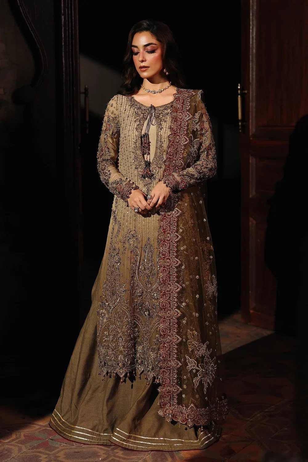 DASTAN-EJASHAN 02 clothing in brown, mocha brown tones.