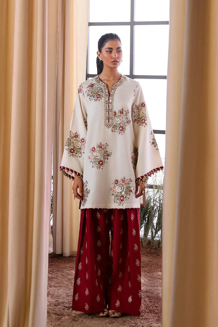 Ethnc - Off White pakistani fashion outfit in white, maroon tones.