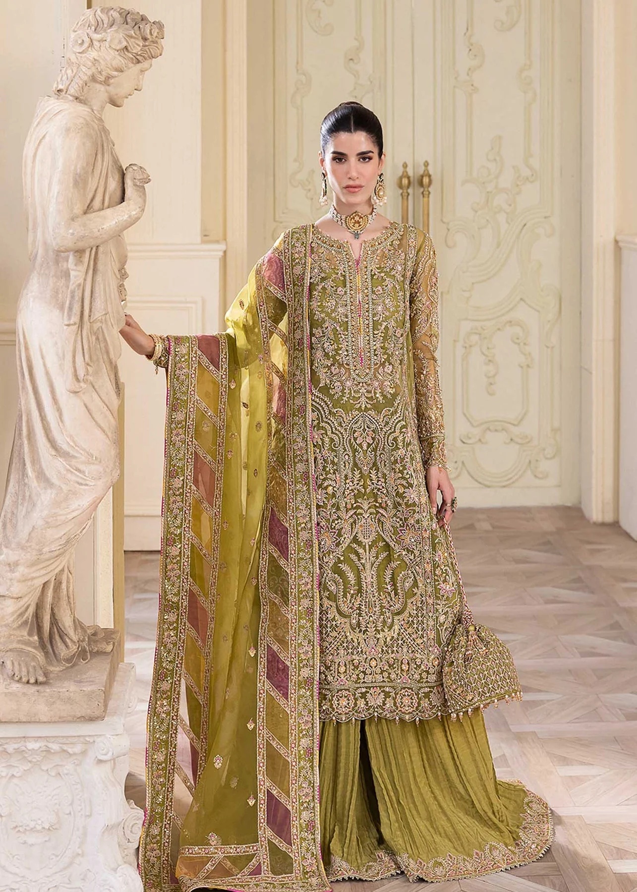 Halena pakistani fashion outfit with coordinated formal styling.