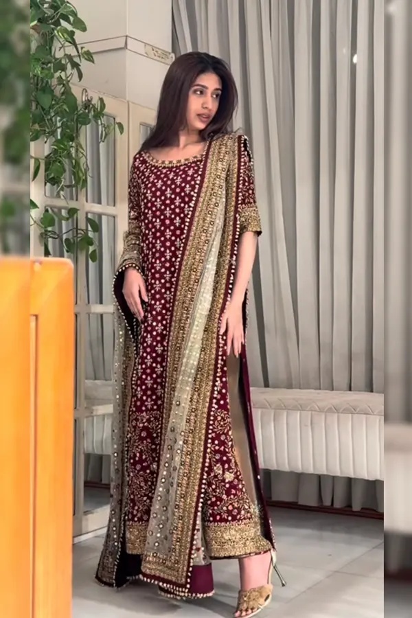 Haris Shakeel – Areesha pakistani fashion outfit with coordinated formal styling.
