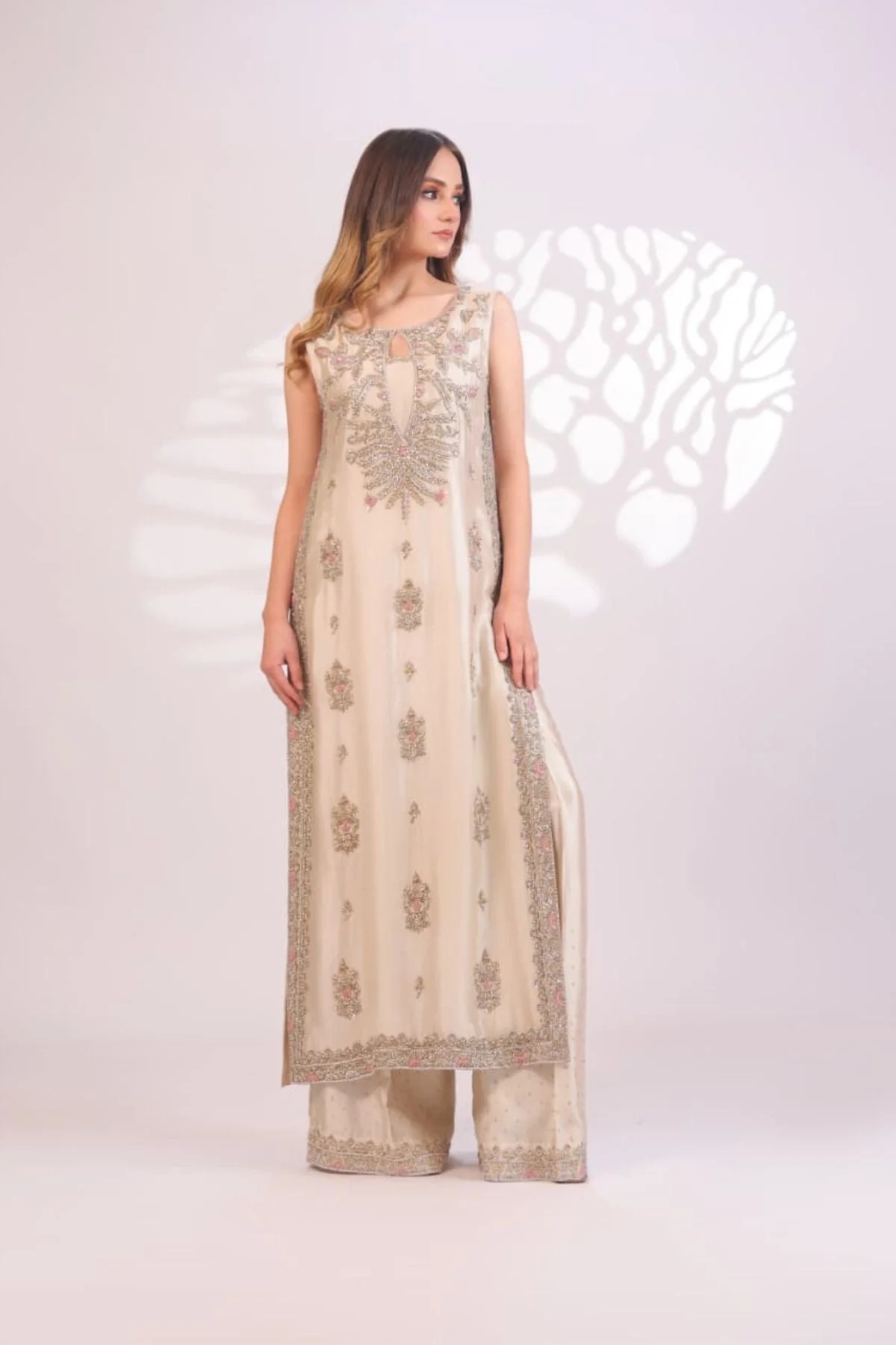 Ivory Bloom Pakistani fashion outfit in ivory, gold tones.