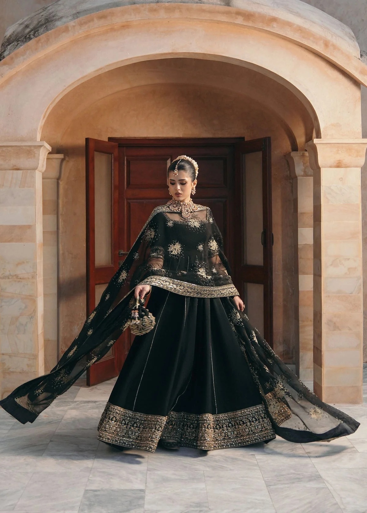 Kajal Pakistani fashion outfit in black tones.