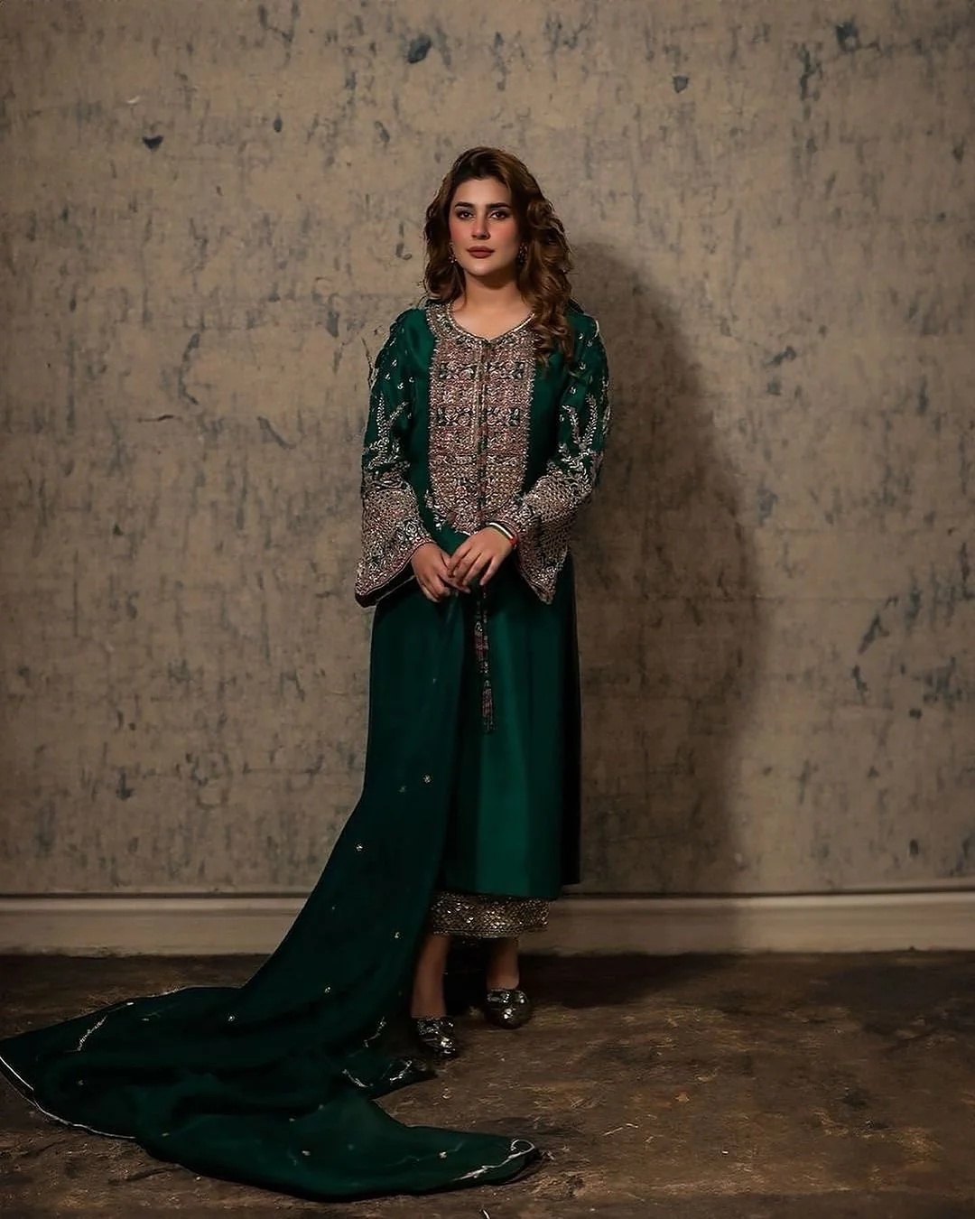 Kubra pakistani fashion outfit with coordinated formal styling.