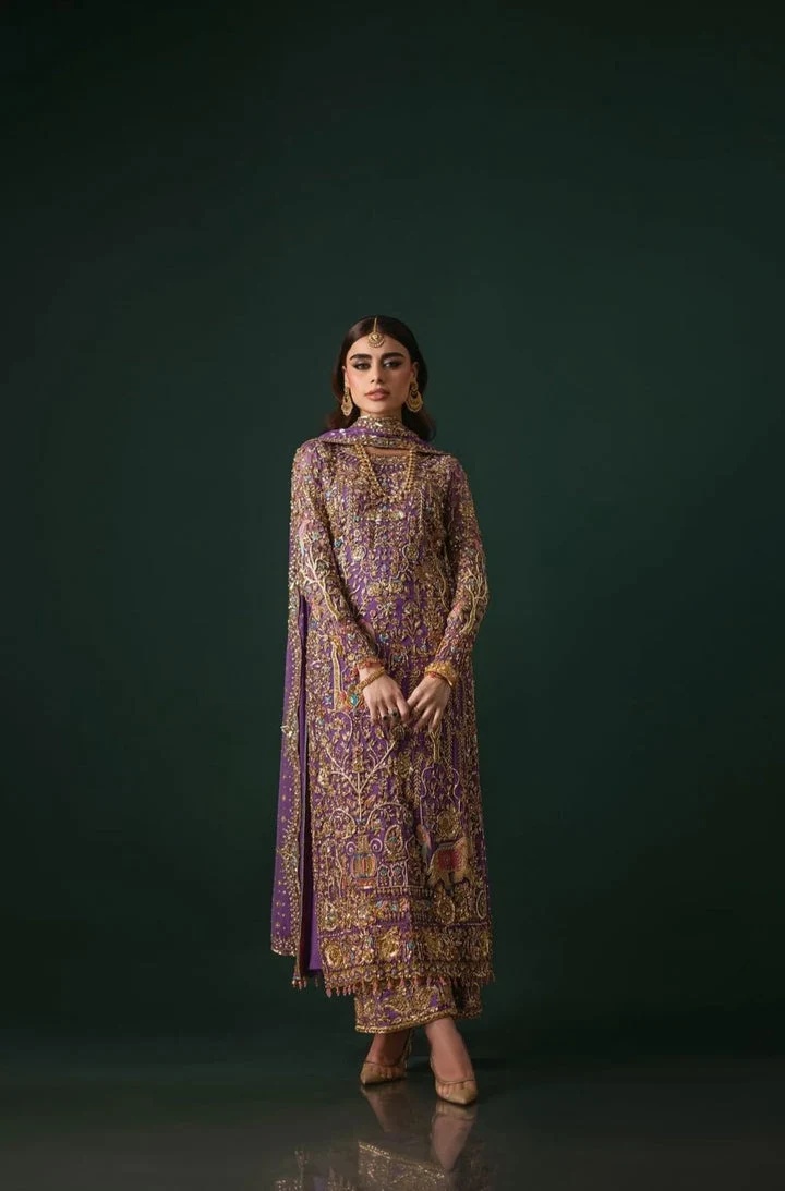 Nomi Ansari Couture pakistani fashion outfit in purple tones.