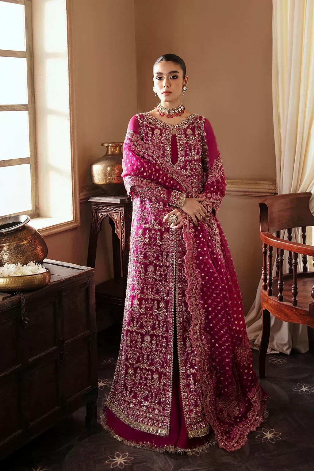 RAIZEL pakistani fashion outfit with coordinated formal styling.