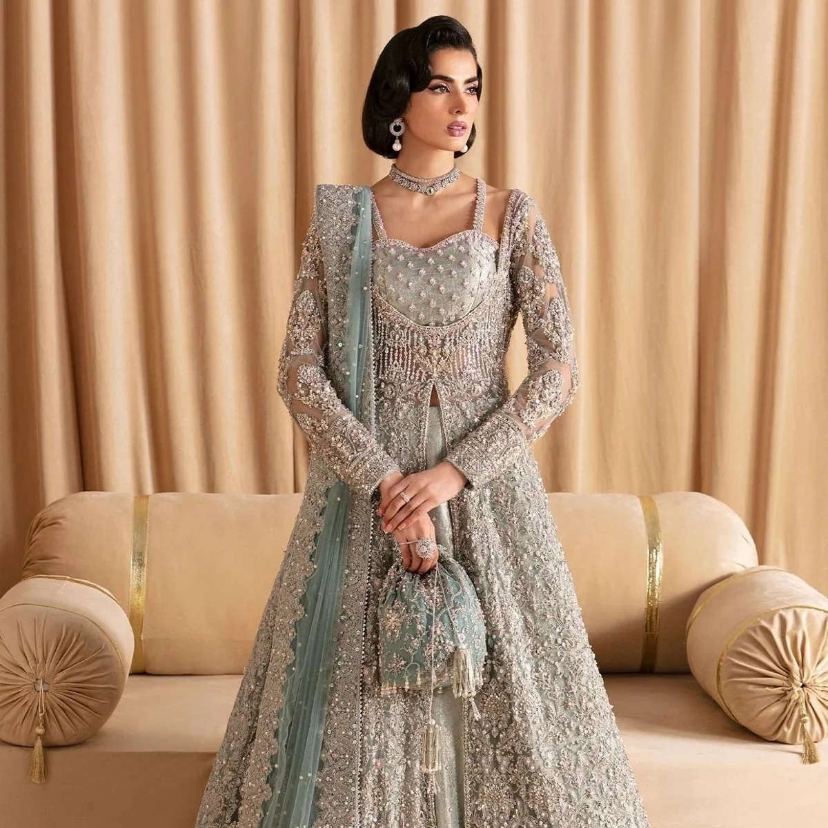 RIJA I KANWAL MALIK clothing in blue tones.