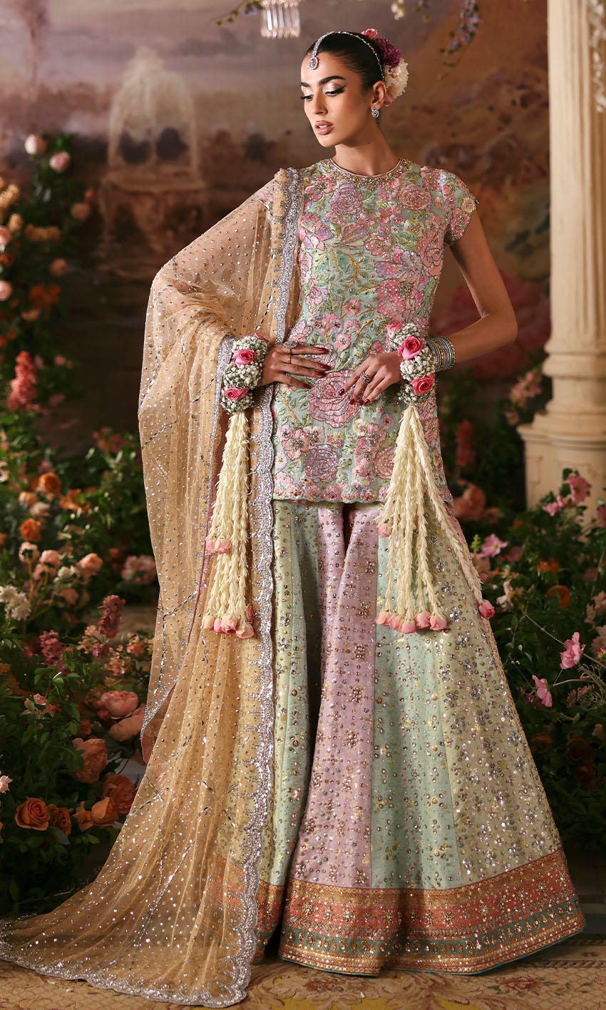 Rosebud pakistani fashion outfit with coordinated formal styling.