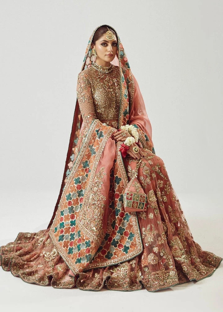 Saaz pakistani fashion outfit in peach tones.