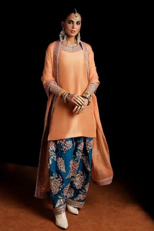 Vaskas - HR pakistani fashion outfit in peach, blue, teal tones.