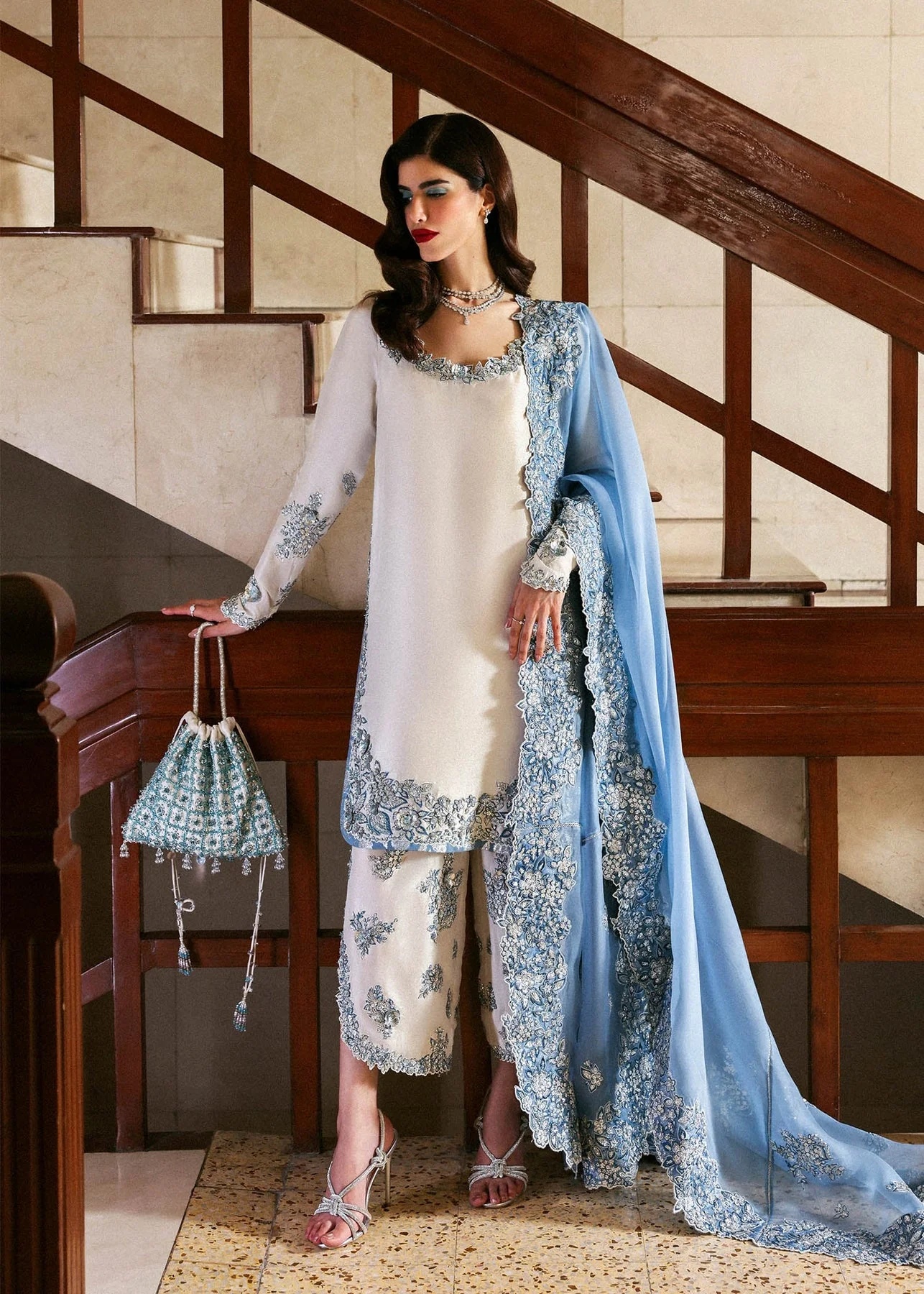 Virelle Pakistani fashion outfit in ivory, blue, silver tones.