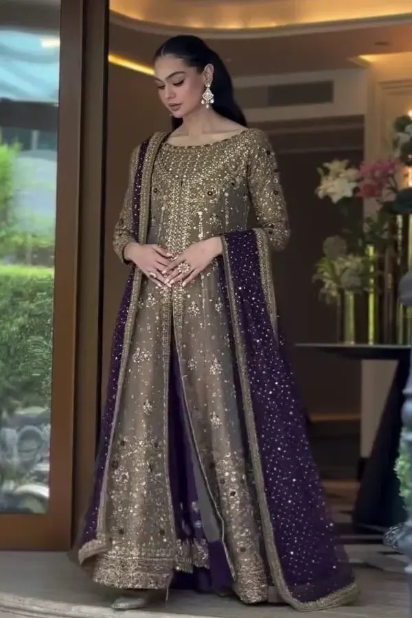 Zari Mesuri - Haris Shakeel pakistani fashion outfit with coordinated formal styling.