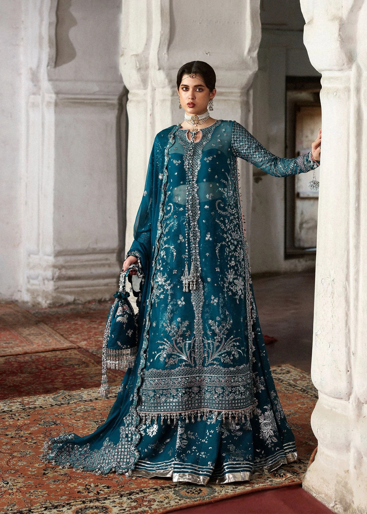 Zebunisa Pakistani fashion outfit in teal tones.