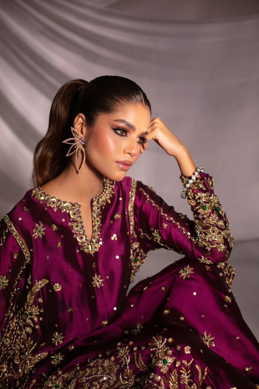 02 pakistani fashion outfit with coordinated formal styling.