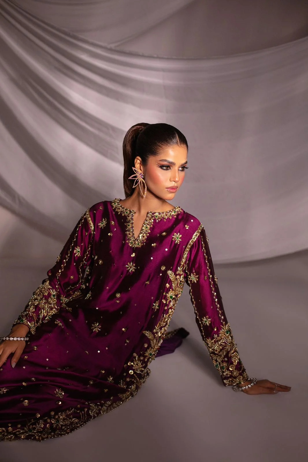 02 pakistani fashion outfit with coordinated formal styling.