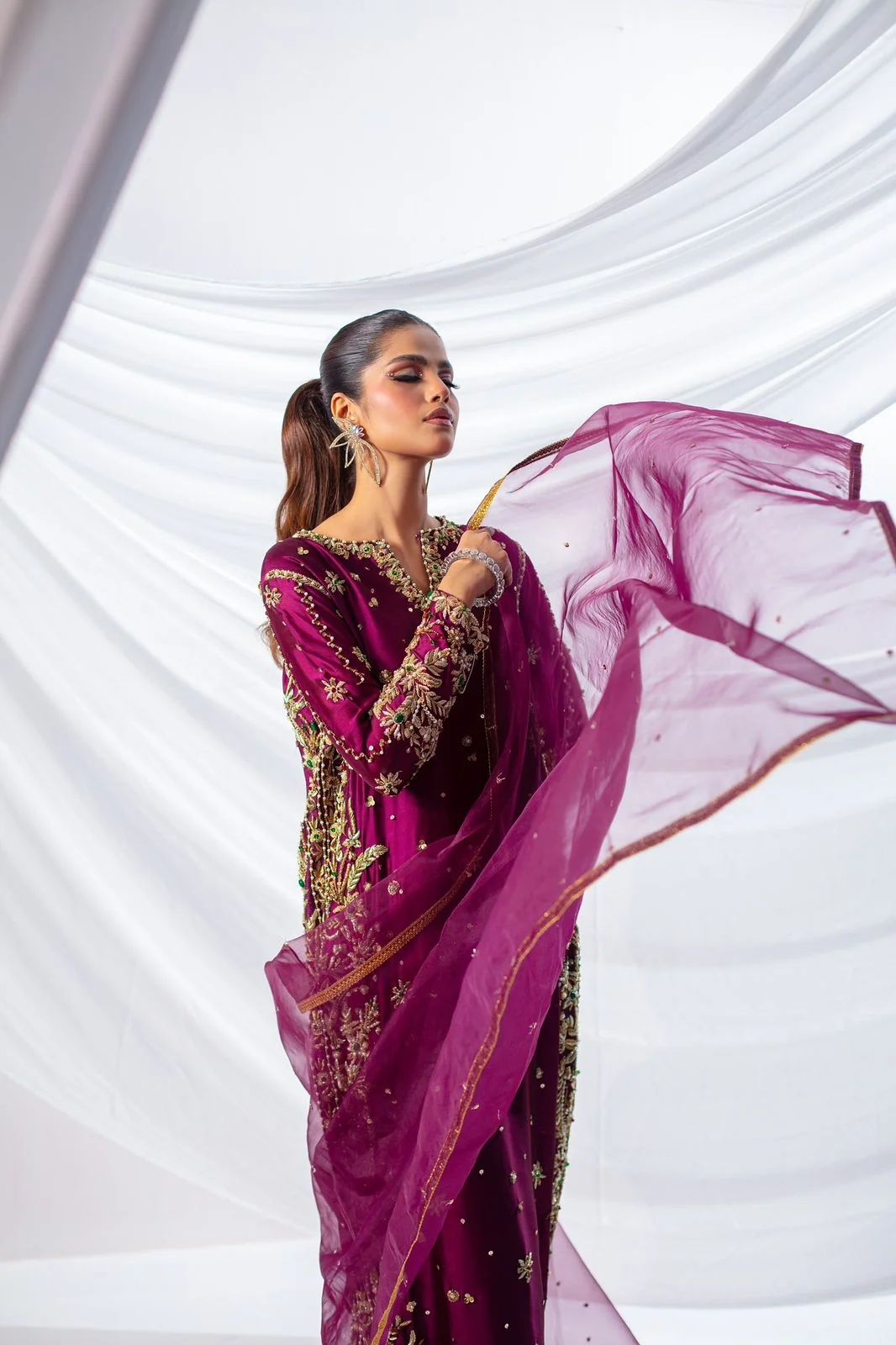 02 pakistani fashion outfit with coordinated formal styling.