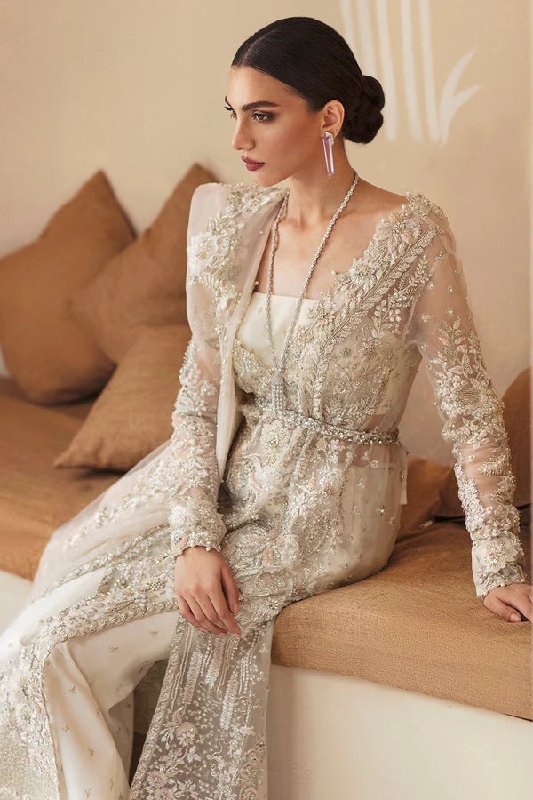 ANYA pakistani fashion outfit in white, pink tones.