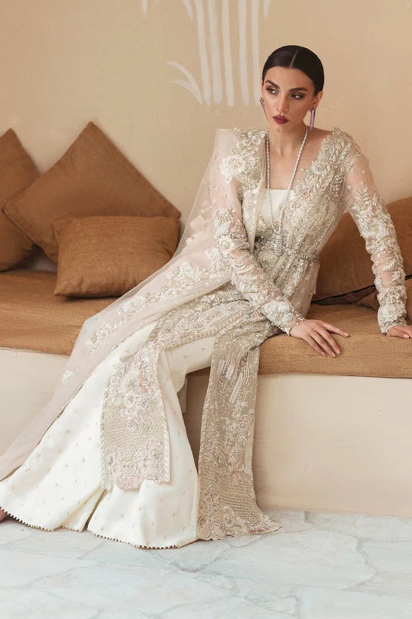 ANYA pakistani fashion outfit in white, pink tones.