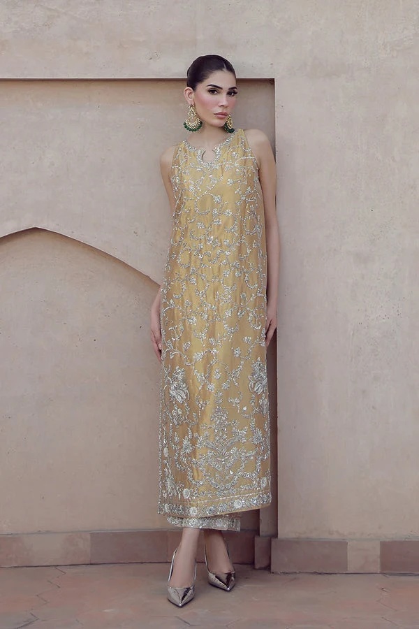 Aakifah Pakistani fashion outfit in gold, yellow tones.