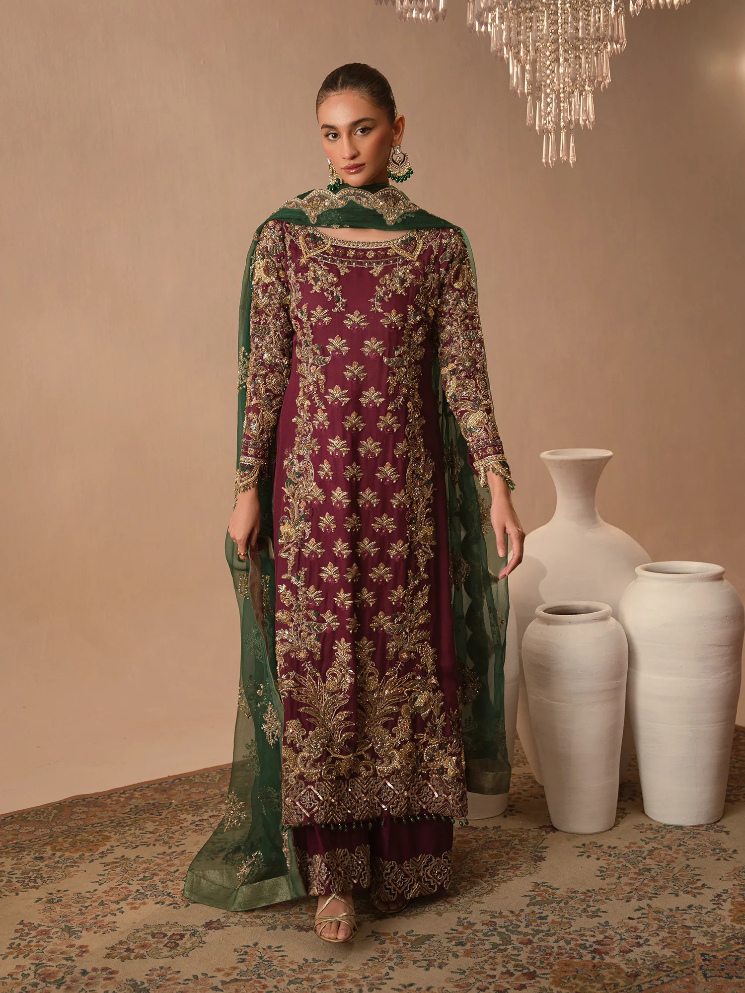 Afsana-e-Zari pakistani fashion outfit in green, emerald green tones.
