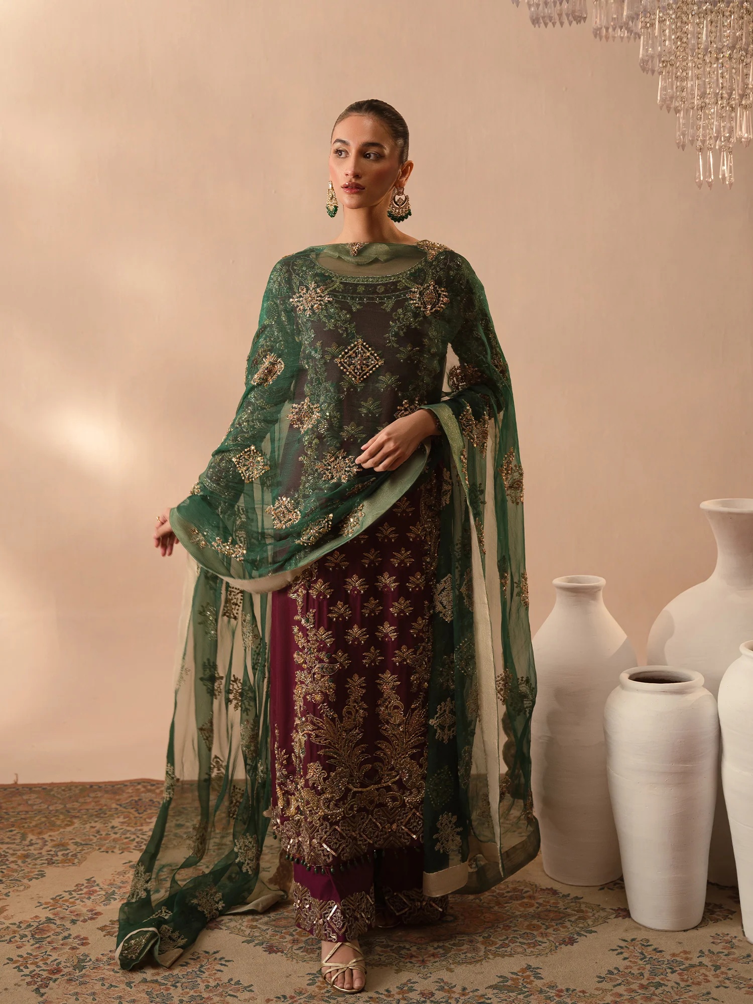 Afsana-e-Zari pakistani fashion outfit in green, emerald green tones.