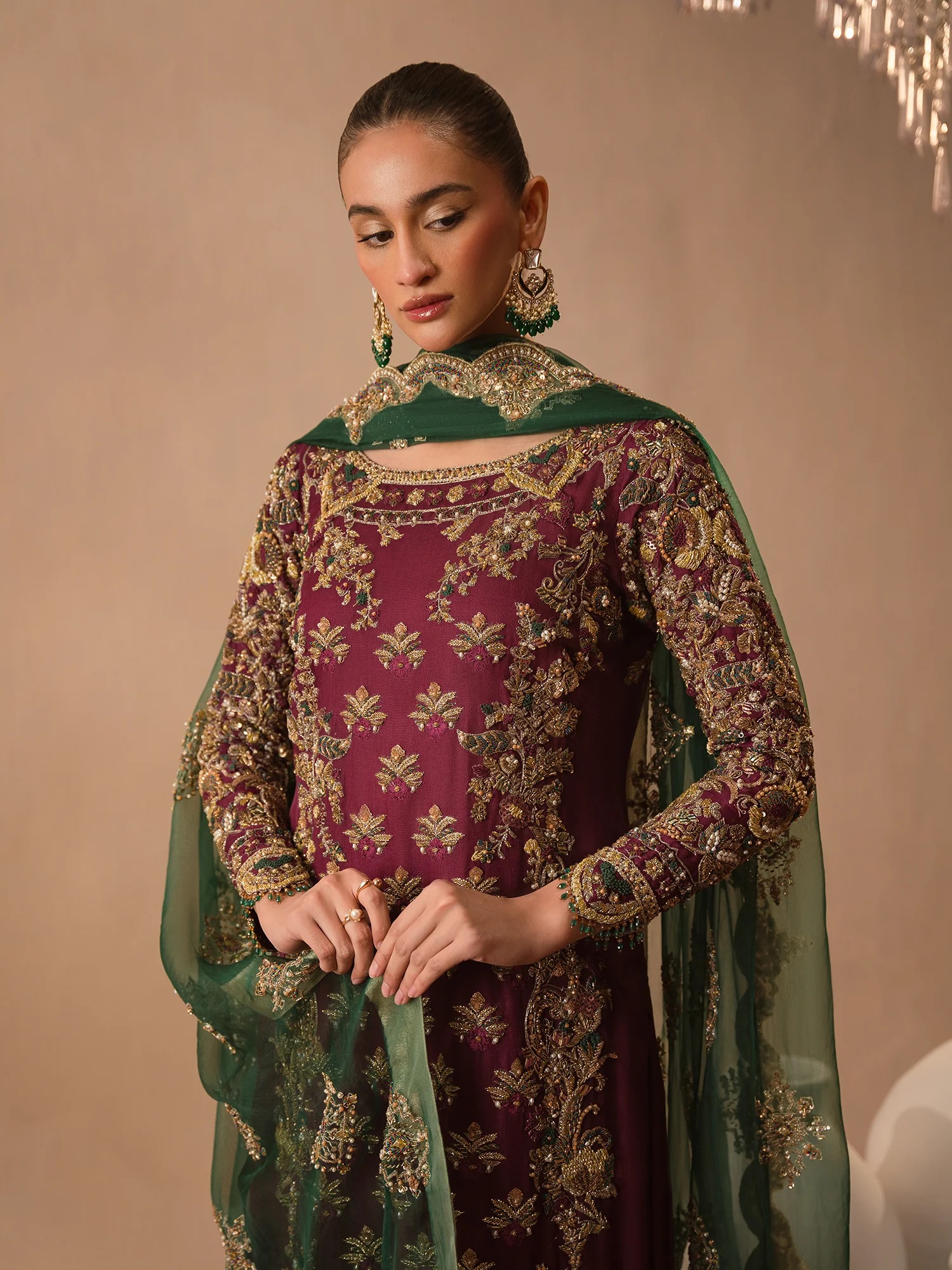 Afsana-e-Zari pakistani fashion outfit in green, emerald green tones.