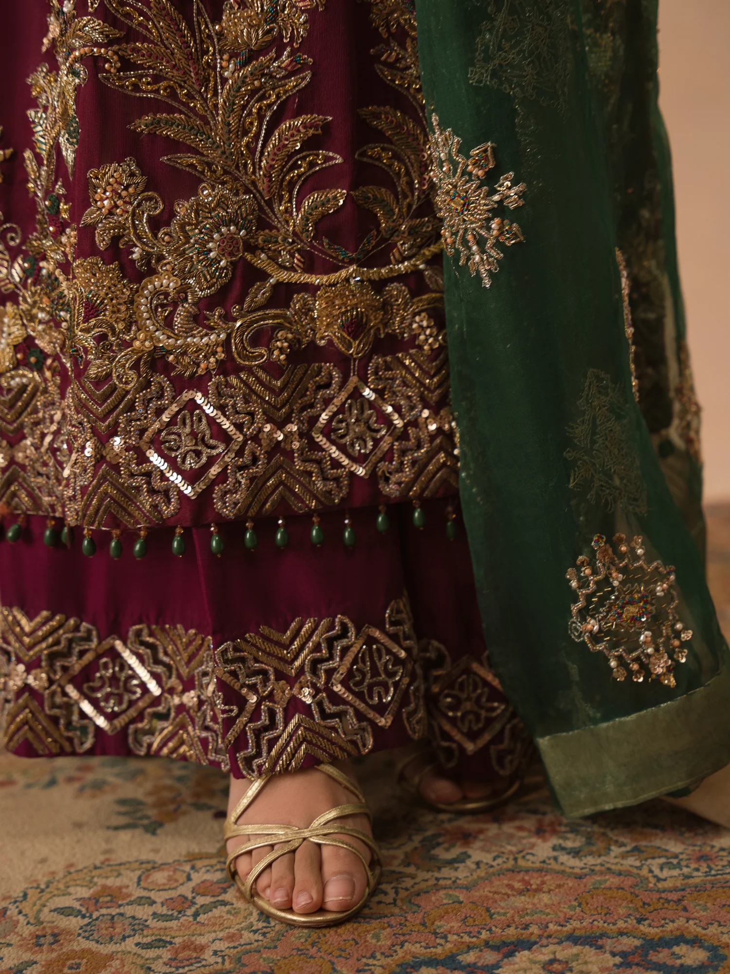 Afsana-e-Zari pakistani fashion outfit in green, emerald green tones.