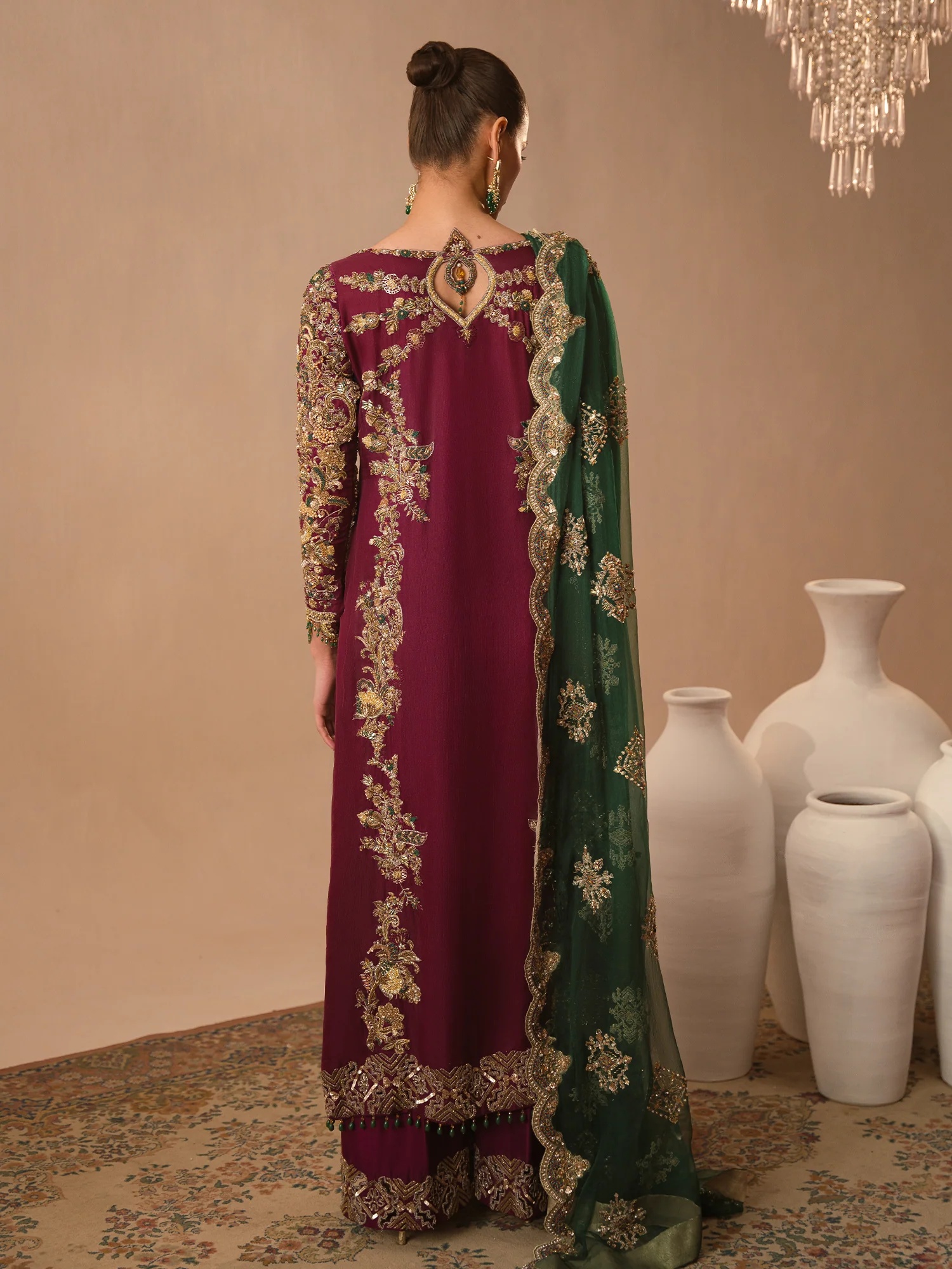 Afsana-e-Zari pakistani fashion outfit in green, emerald green tones.