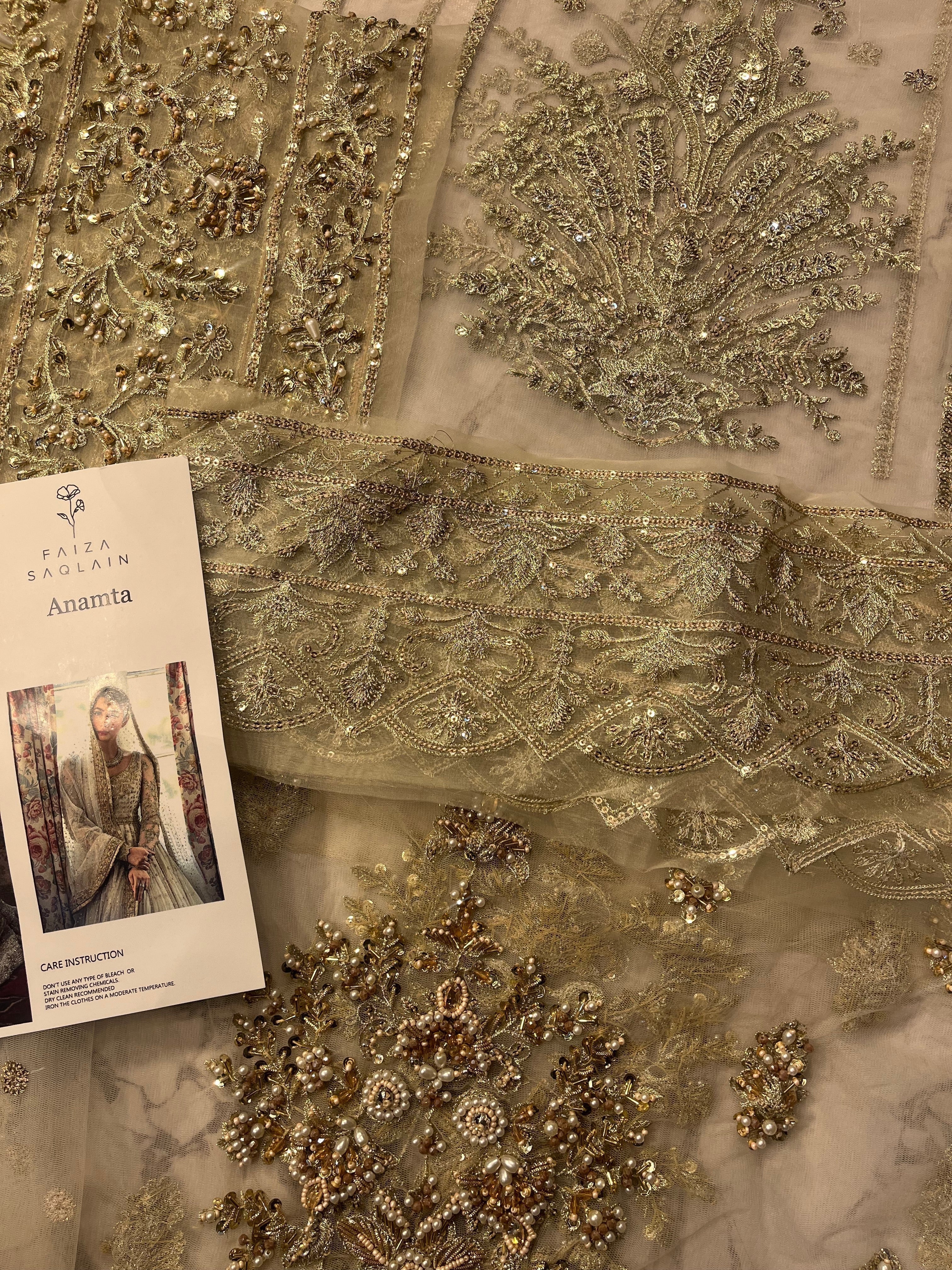 Anamta pakistani fashion outfit in ivory tones.