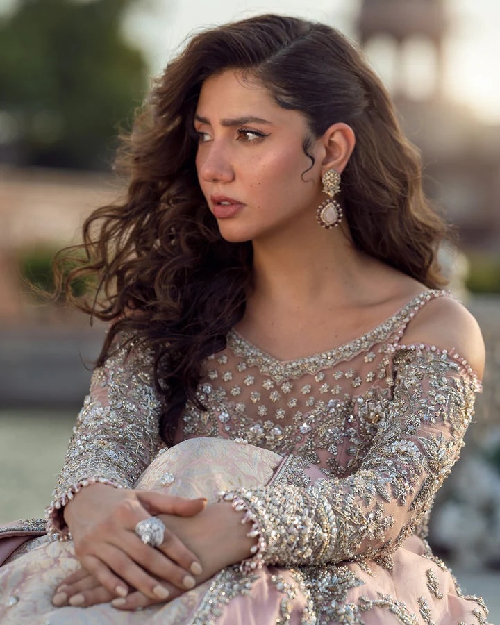 Aysana pakistani fashion outfit with coordinated formal styling.