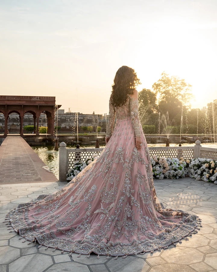 Aysana pakistani fashion outfit with coordinated formal styling.