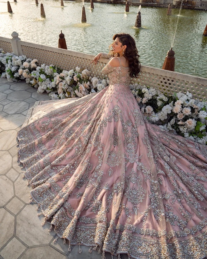 Aysana pakistani fashion outfit with coordinated formal styling.