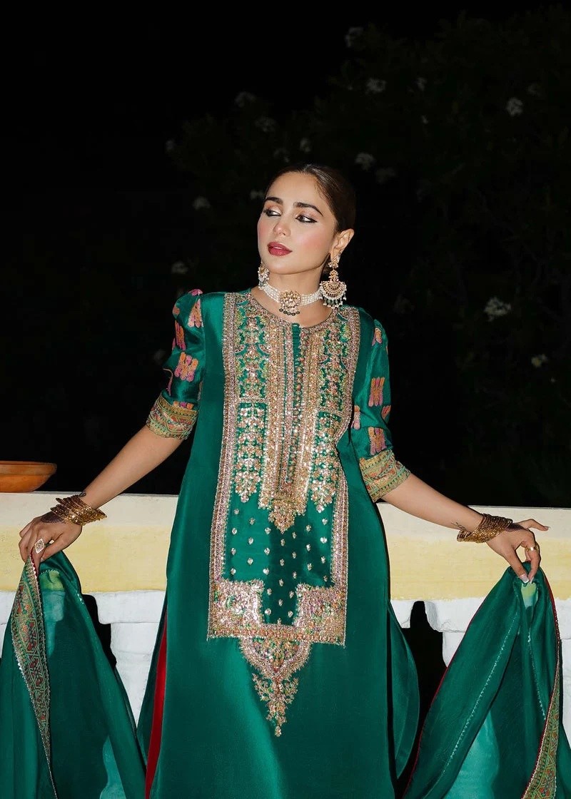 Beryl Pakistani fashion outfit in green, gold, pink, red tones.