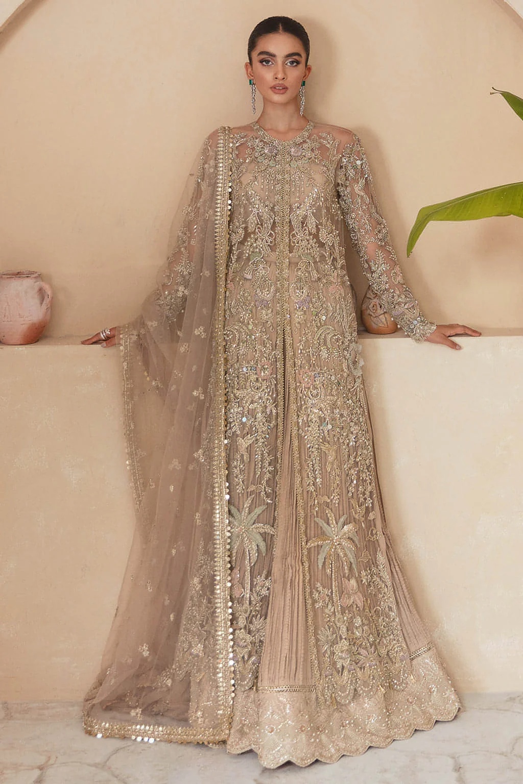 Dahlia pakistani fashion outfit in gold tones.