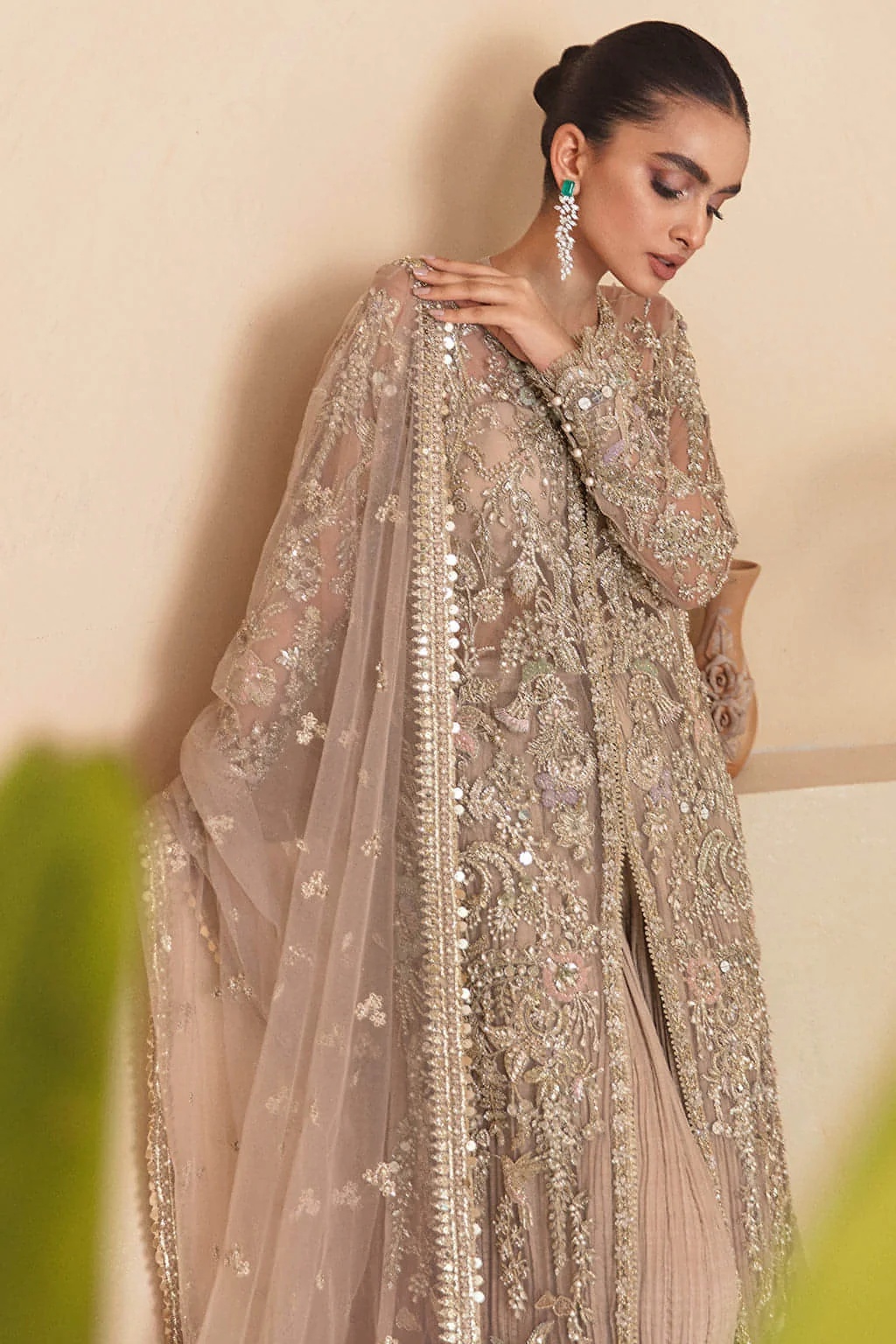 Dahlia pakistani fashion outfit in gold tones.