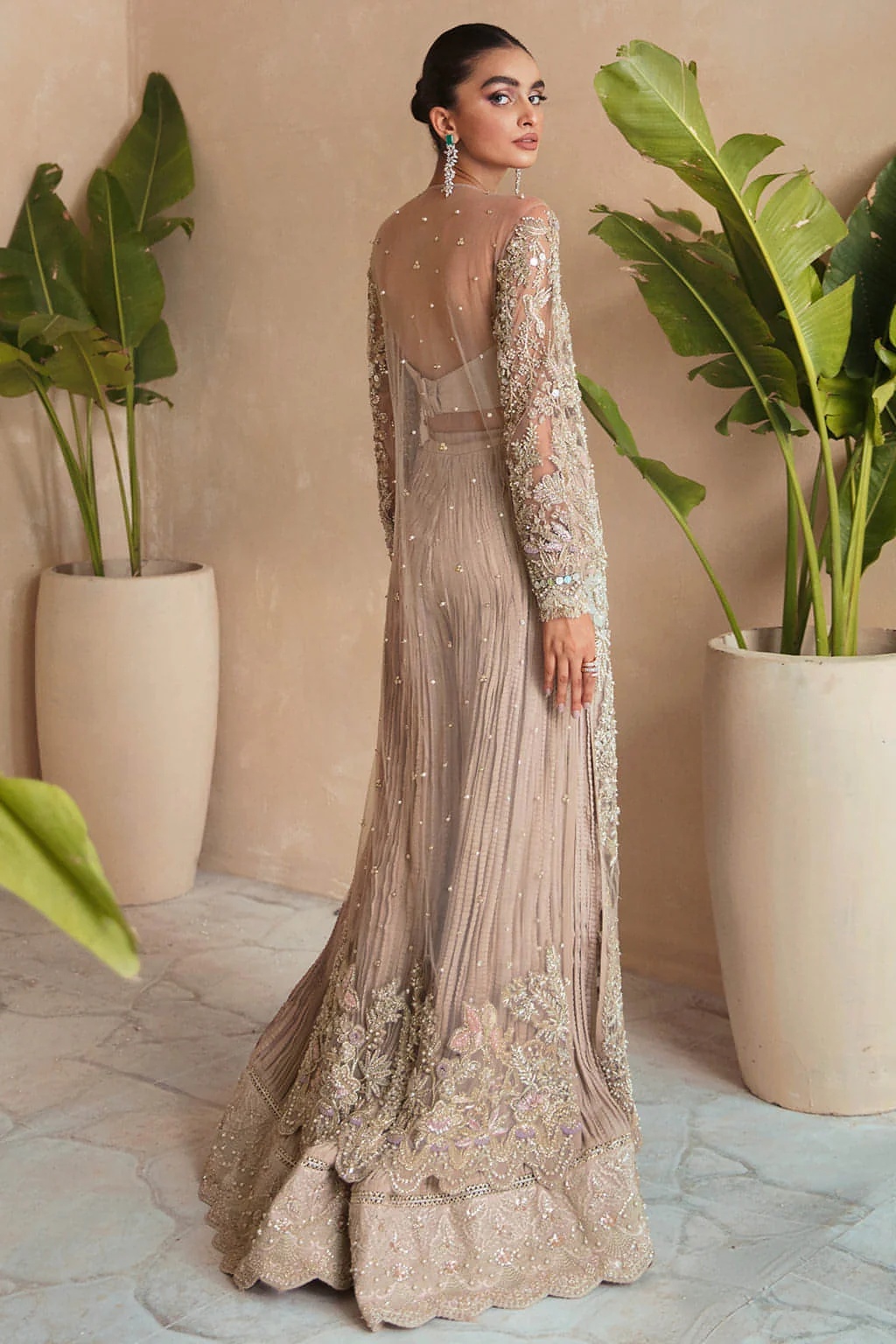 Dahlia pakistani fashion outfit in gold tones.