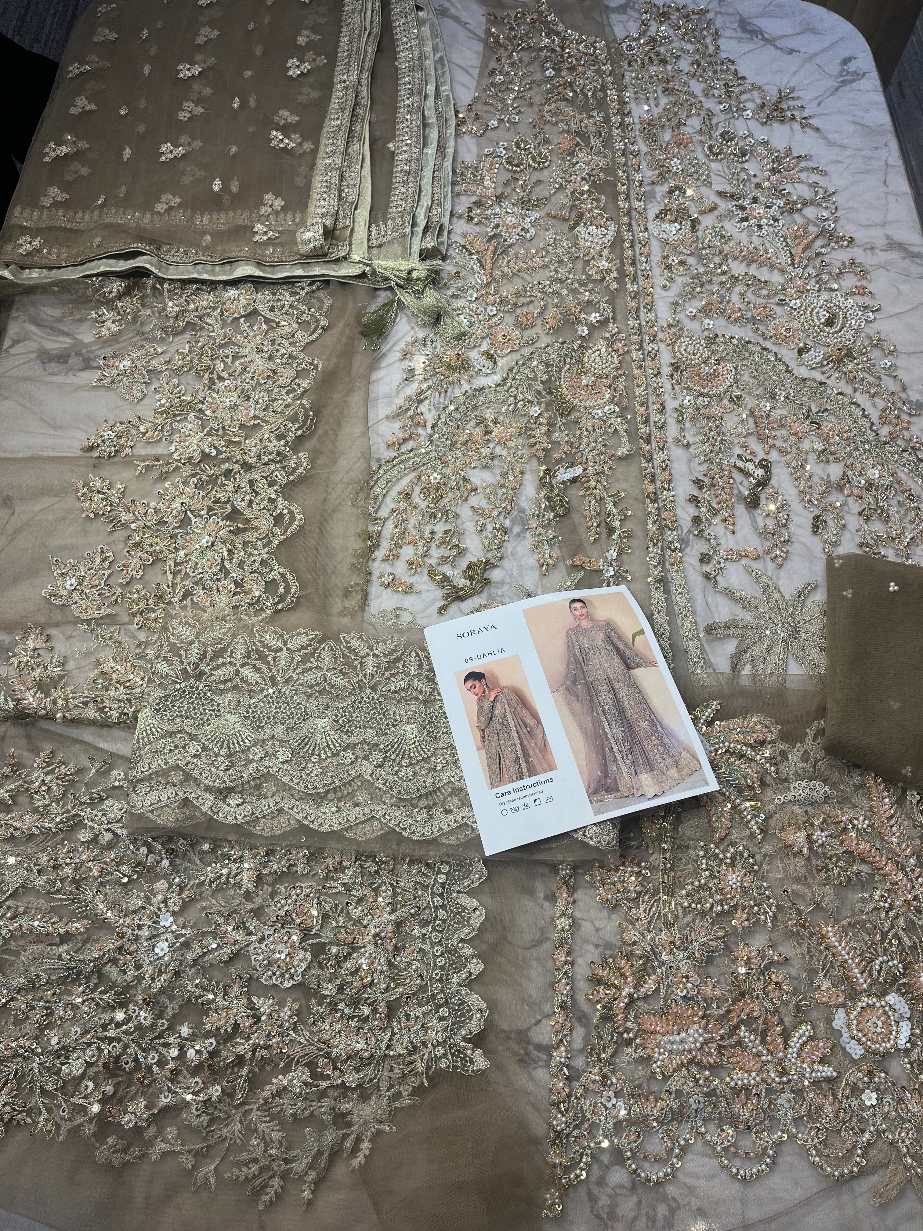 Dahlia pakistani fashion outfit in gold tones.