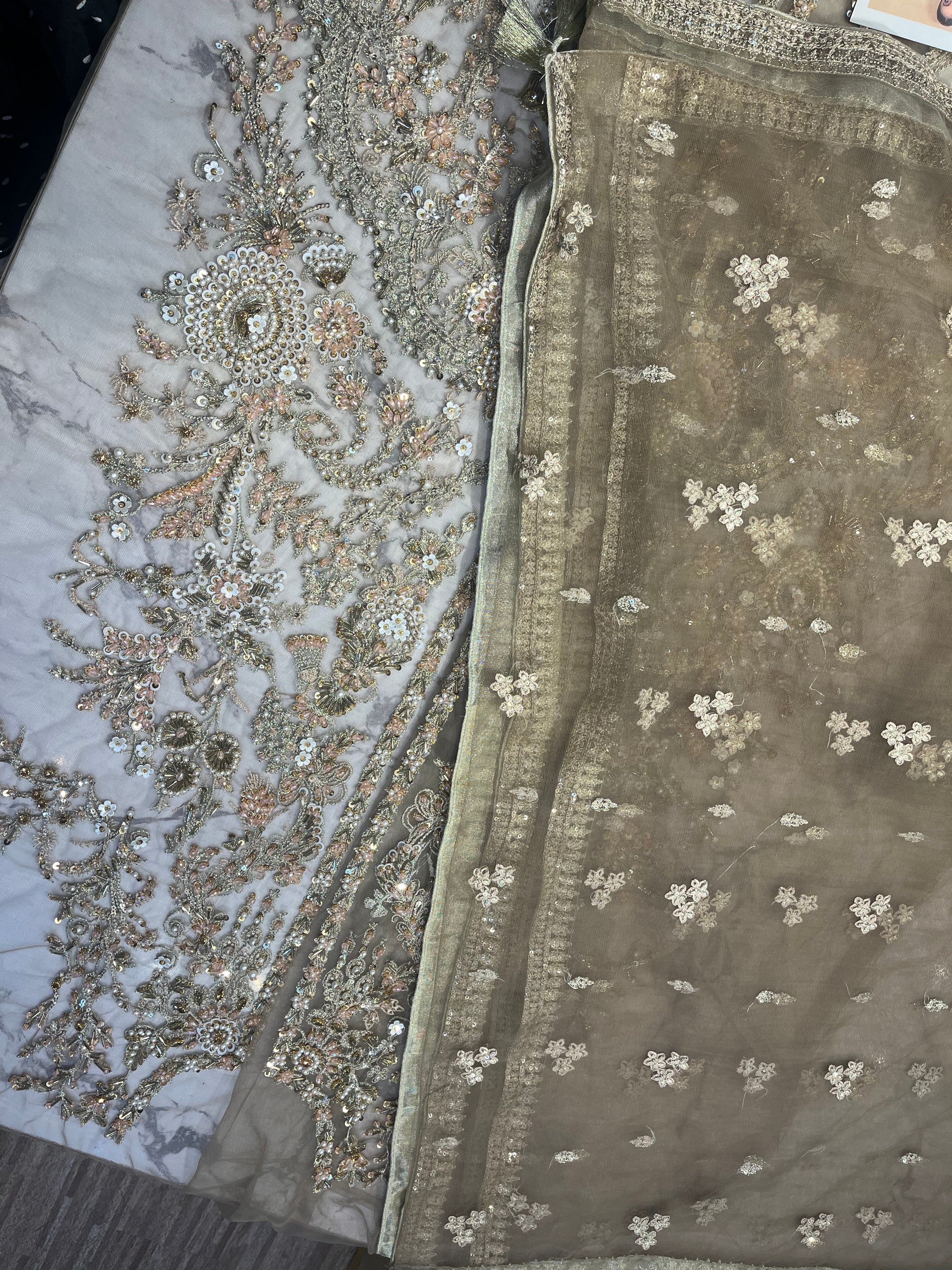 Dahlia pakistani fashion outfit in gold tones.