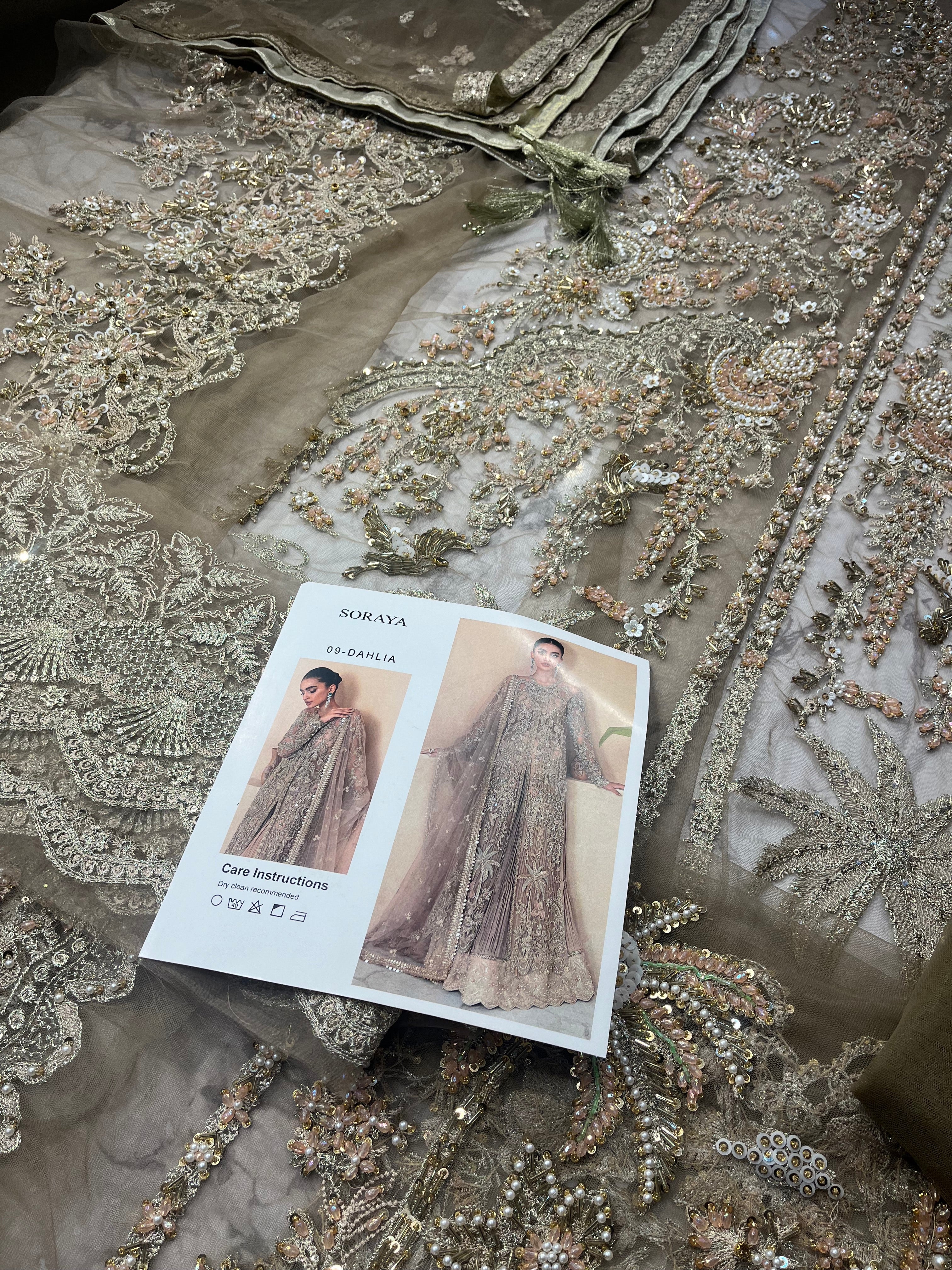 Dahlia pakistani fashion outfit in gold tones.