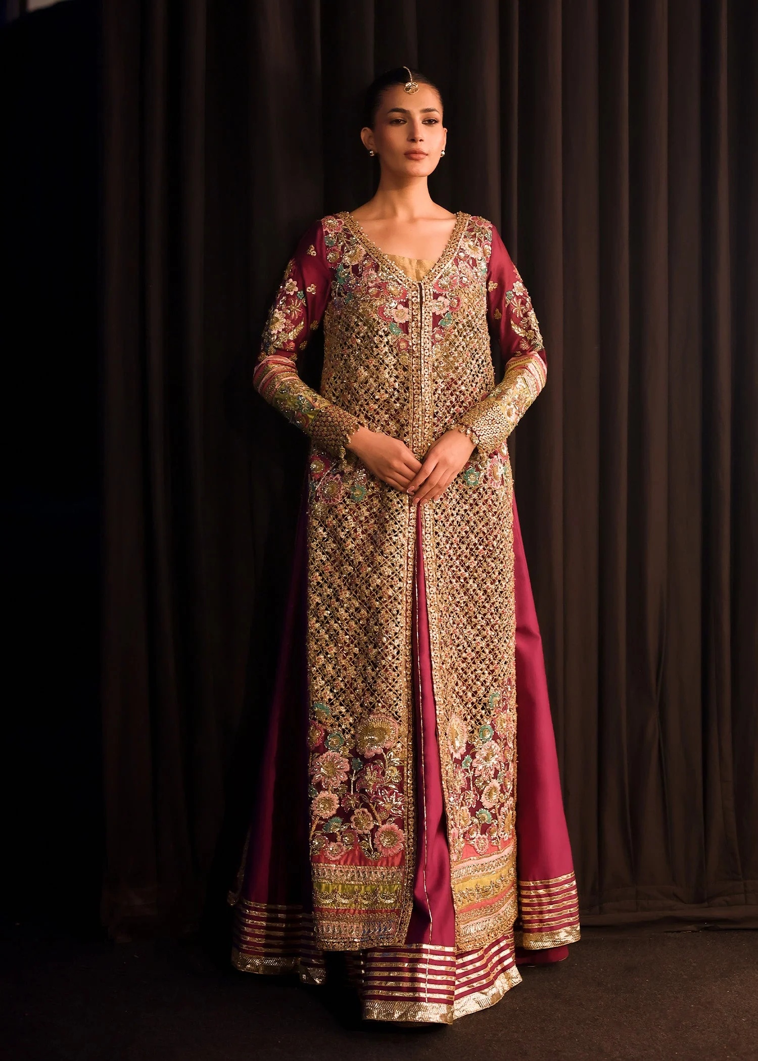 Dilara pakistani fashion outfit with coordinated formal styling.