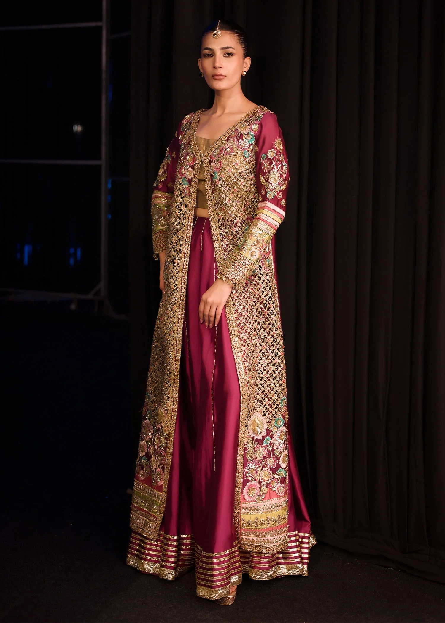 Dilara pakistani fashion outfit with coordinated formal styling.