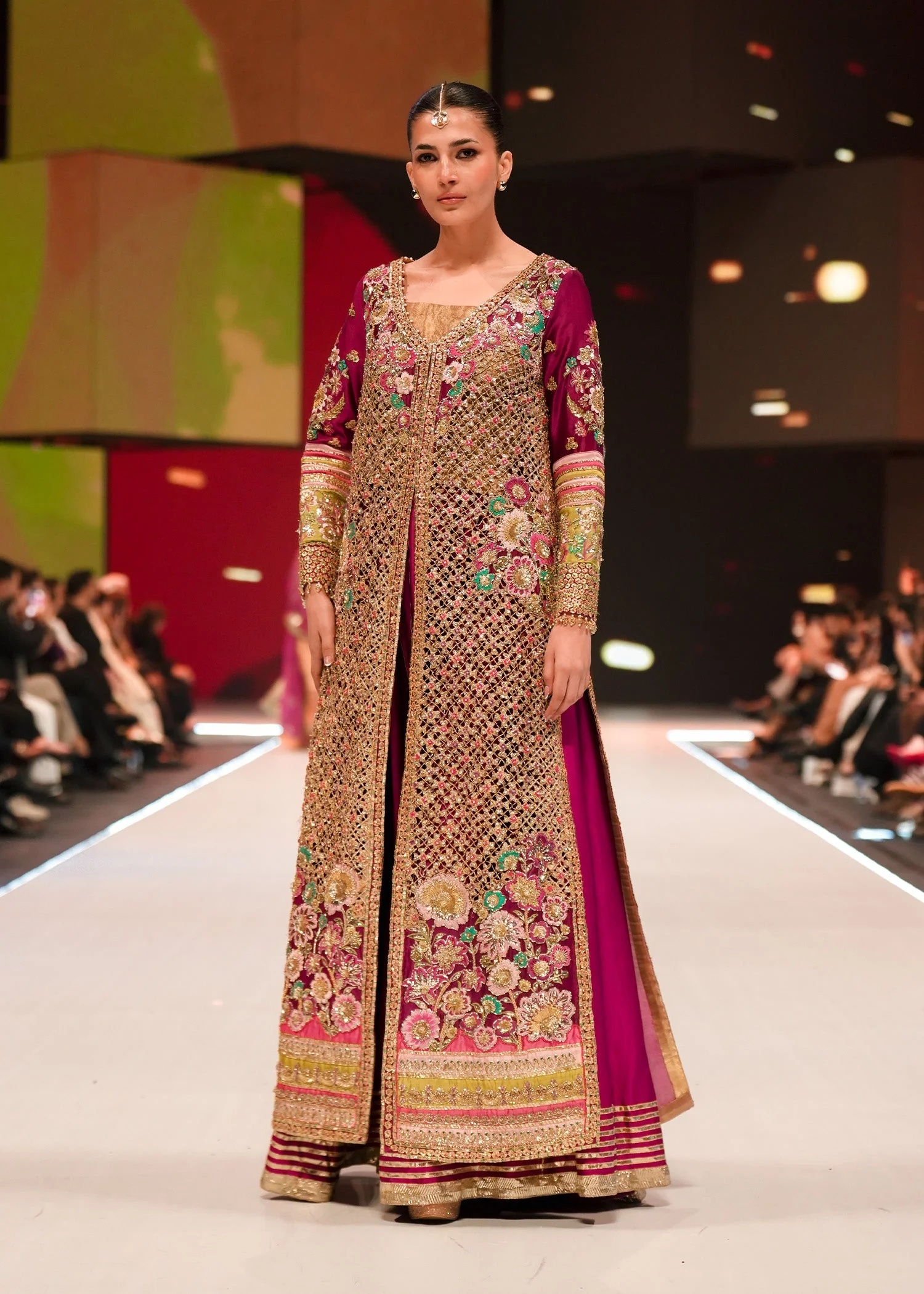 Dilara pakistani fashion outfit with coordinated formal styling.