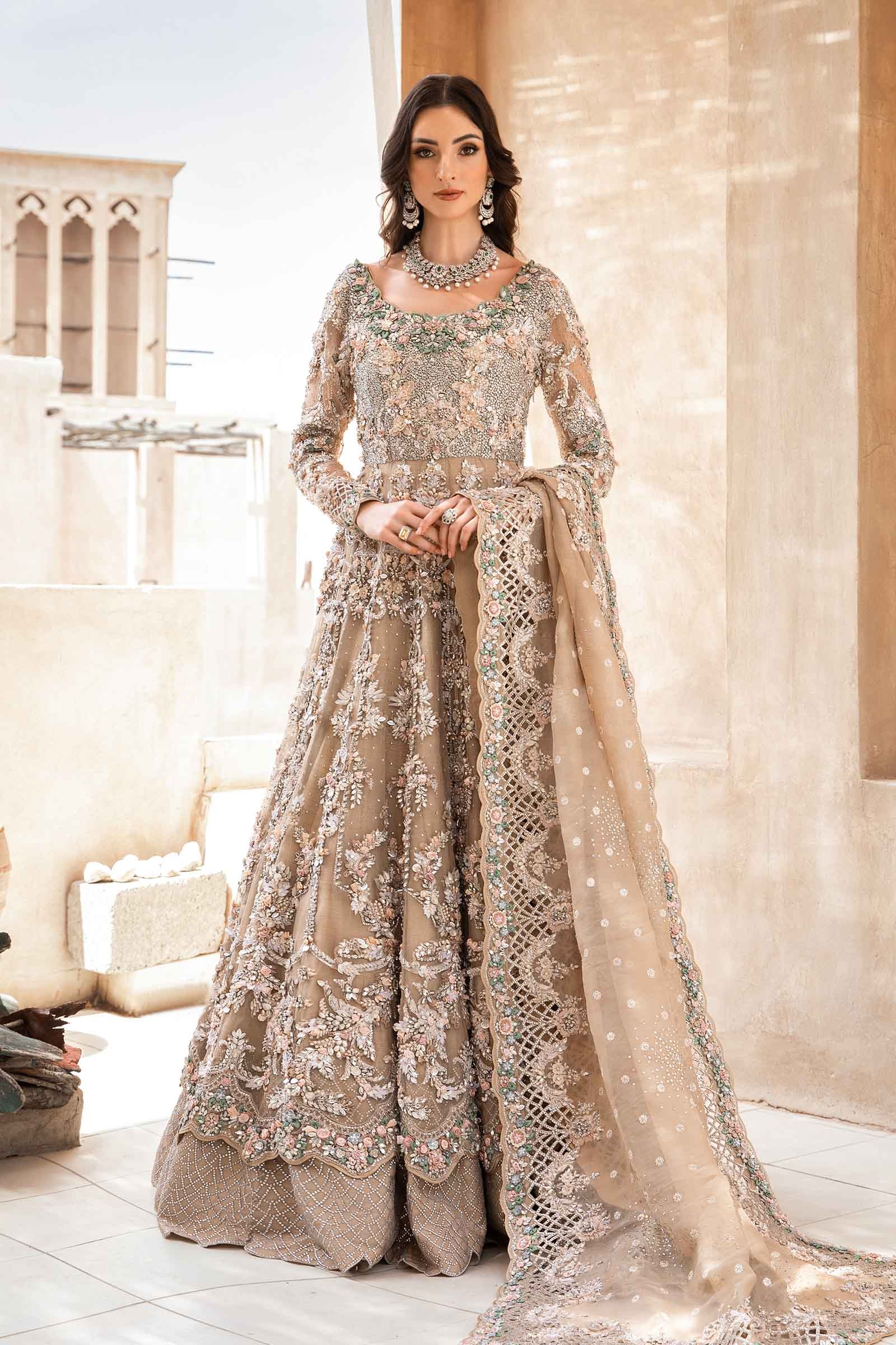 EX-151 pakistani fashion outfit in peach tones.