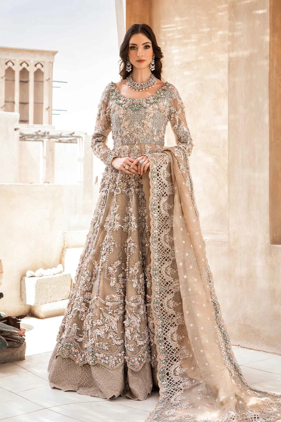 EX-151 pakistani fashion outfit in peach tones.