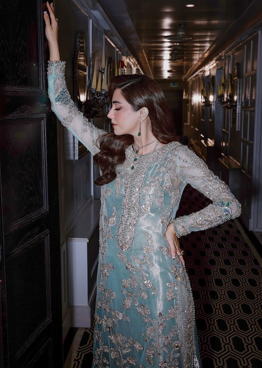 Ferozeah pakistani fashion outfit with coordinated formal styling.