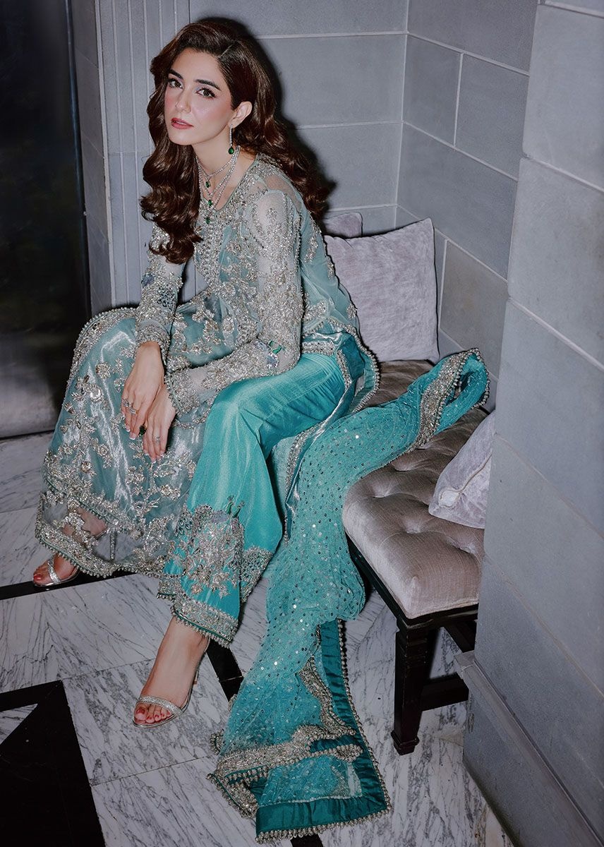 Ferozeah pakistani fashion outfit with coordinated formal styling.