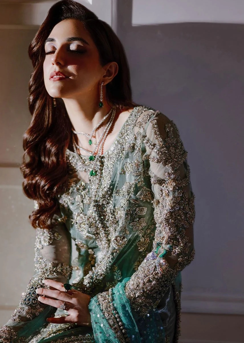 Ferozeah pakistani fashion outfit with coordinated formal styling.