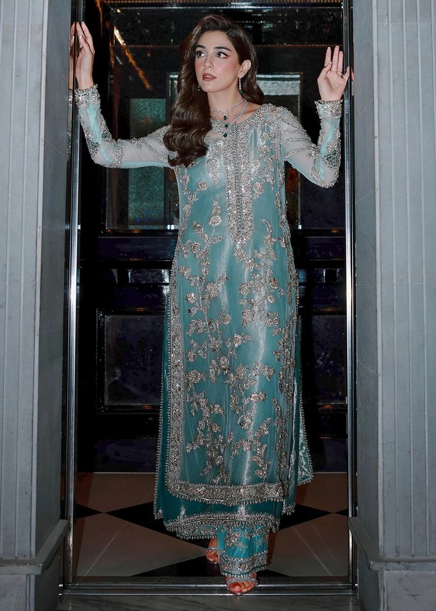 Ferozeah pakistani fashion outfit with coordinated formal styling.